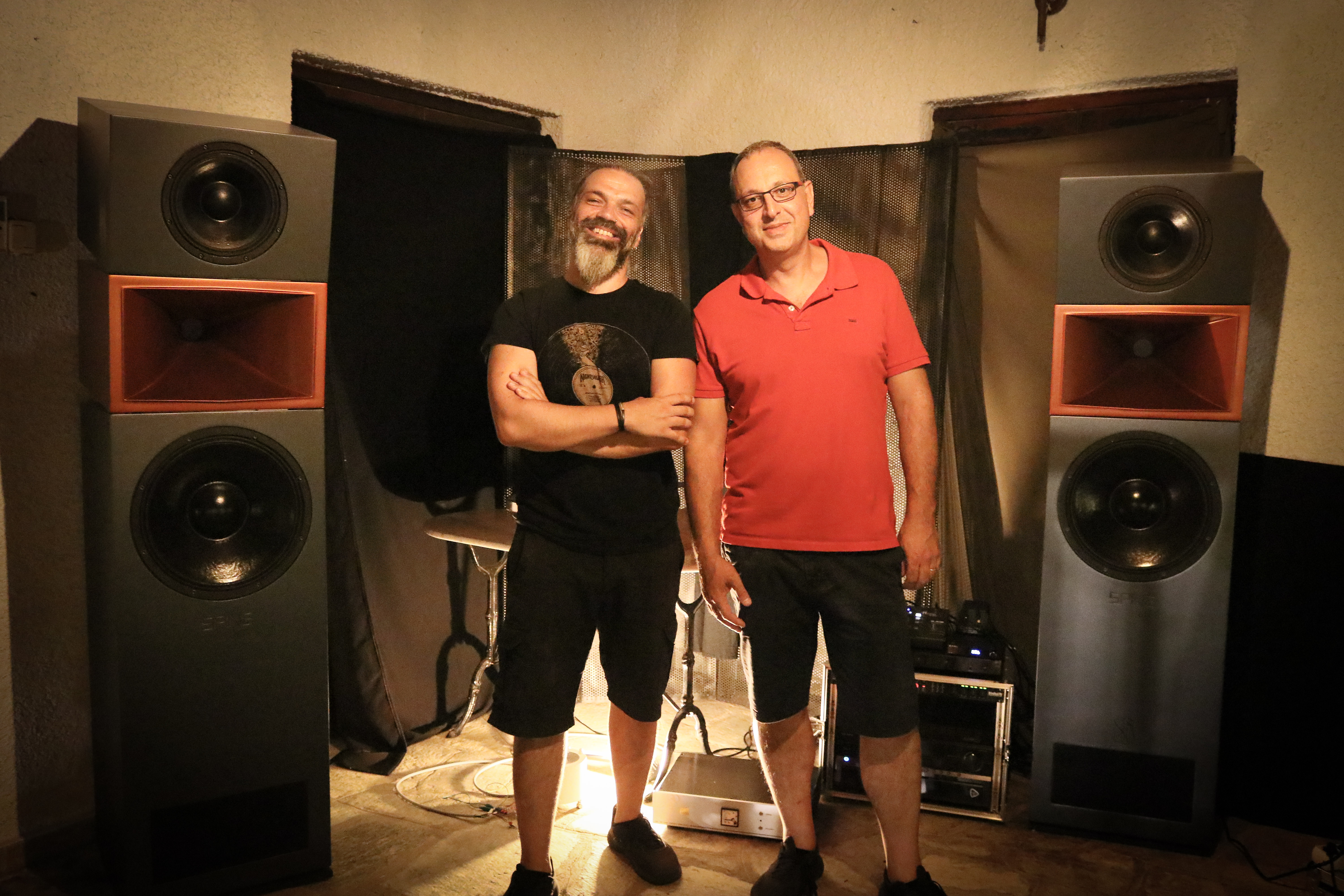 George Bokos and Gregory Karakatsanis of Spine Audio, with their monitor loudspeakers on either side.