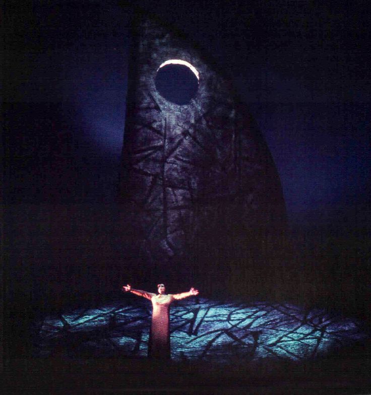 Isolde's Liebestod in Wieland Wagner's 1962 Bayreuth production.  Wieland Wagner's post-War productions broke new ground in opera and theater production through their use of abstract sets, moody lighting, and new approaches to stagecraft